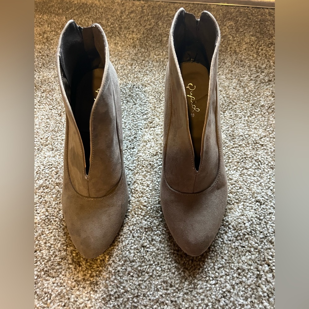 Grey suede ankle booties with deep V cut in front. Lightly worn (2-3x)